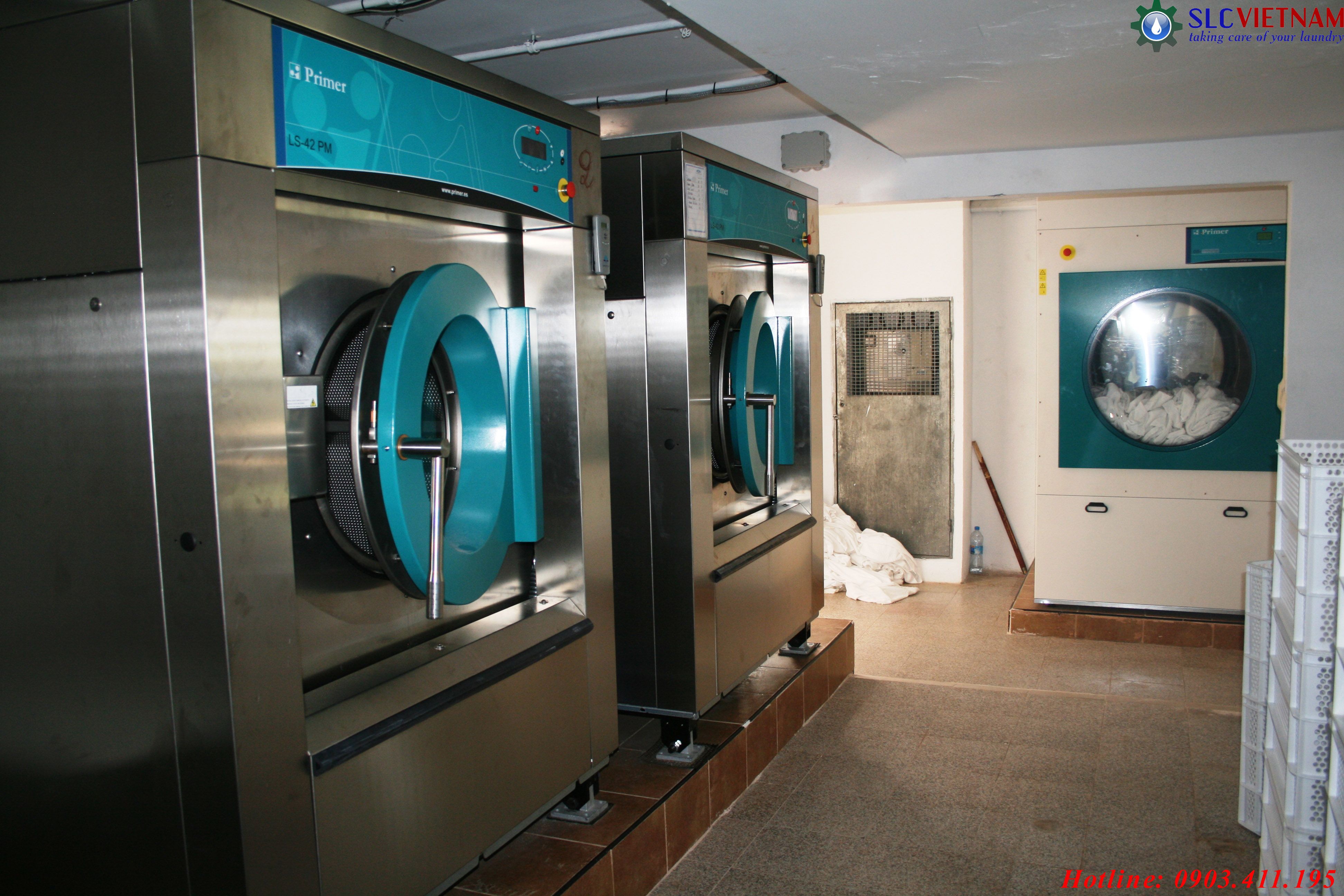 Máy giặt ủi công nghiệp là gì?